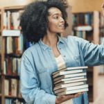A woman browsing a library.